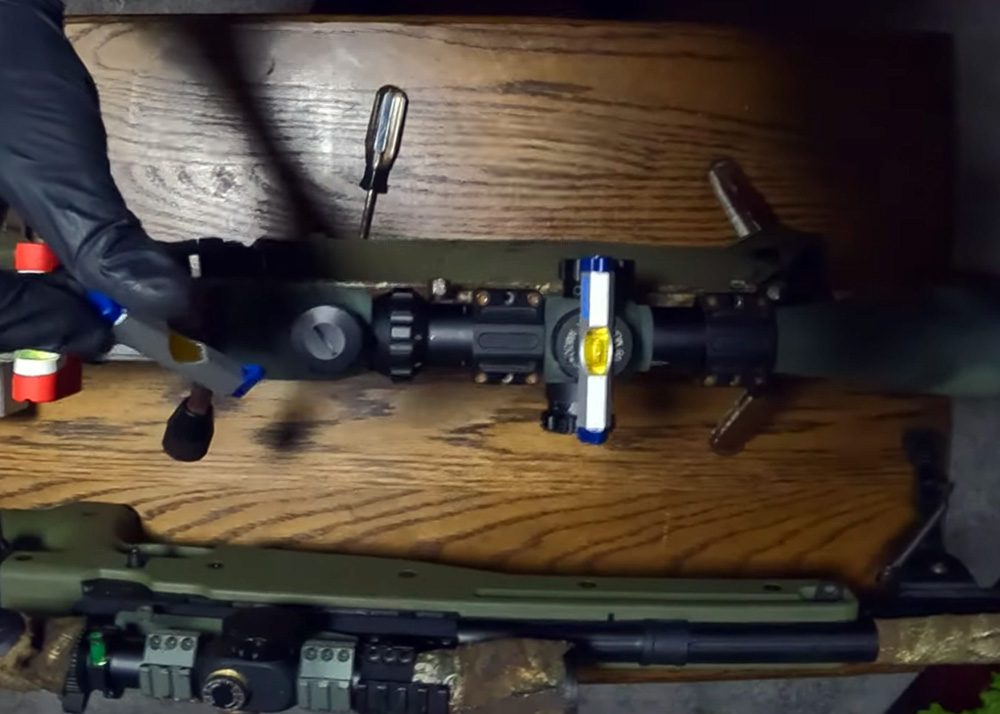 Ghost Ghillie Mounting A Scope On A Sniper Rifle